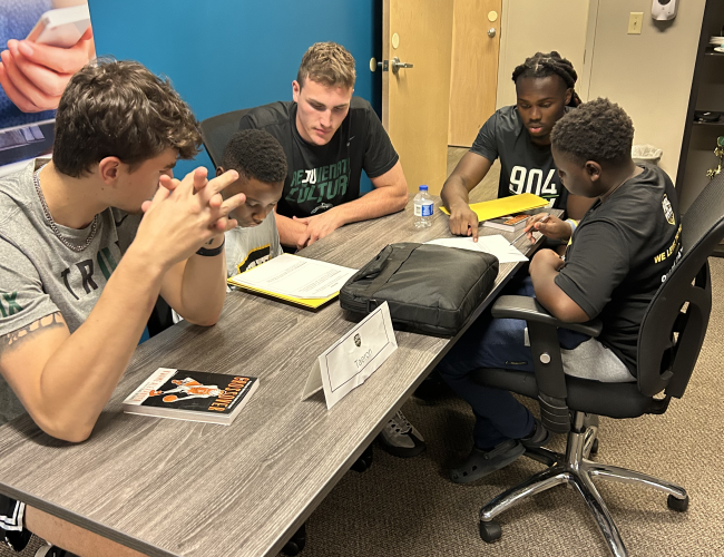 A Look Inside a Huddle Summer Reading- Huddle with JU MBB